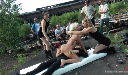 Blonde has BDSM fun outdoors with two dominant girlfriends