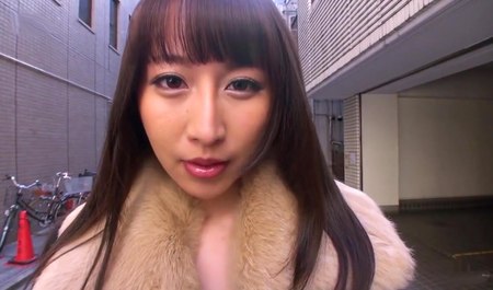 Charming Asian sucks a guy's cock on the street and gets fucked there doggy style