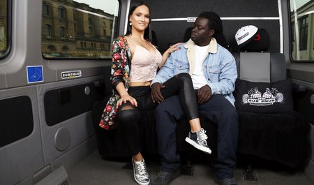 Black rapper fucks a pretty Czech woman in a minibus in different positions