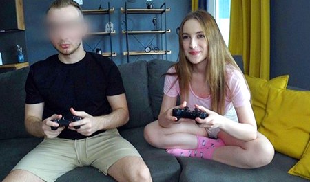 Annie Walker plays video games with her stepbrother and then has sex
