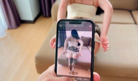 Sweetie Foxy films herself naked on her phone at the instigation of her stepsister