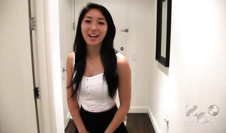 Chinese woman sucks cock in front of camera